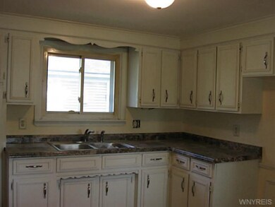 Kitchen New counter top, hardware, paint and floor
