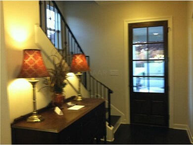 Spacious Foyer with Hand Crafted Hardwood Floors a