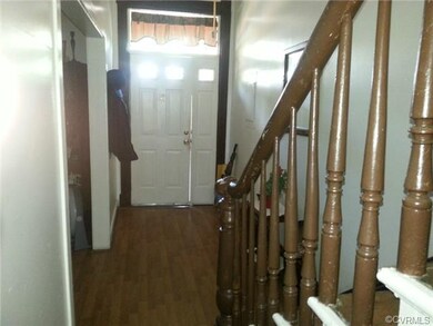 Entry Foyer with stairway to 2nd floor bedrooms.