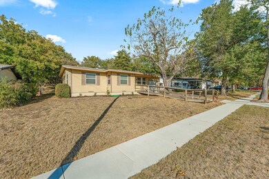 Ranch-style house with a front yard