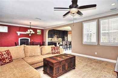 Beautiful crown moldings, upgraded baseboards and tile floors...just gorgeous!