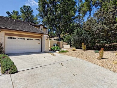 2 car garage with driveway parking