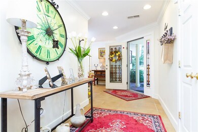 Foyer with stained glass door and side lights