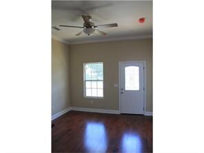 Living Room. Living room features beautiful wood f