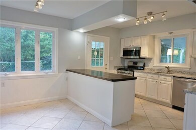 Wow!  This brand new eat-in kitchen features grani
