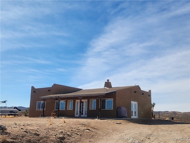 Front of house with french doors