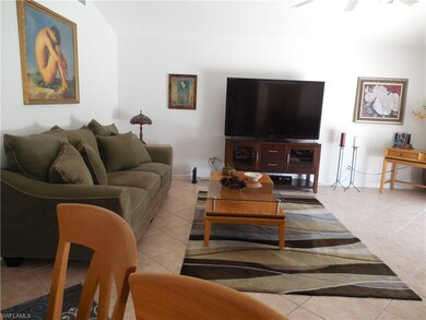 Let side of living room with tile floors and remot