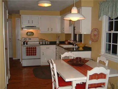 Kitchen. Hardwood floor in kitchen & appliances ar