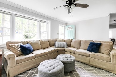 The huge picture window fills the room with light
