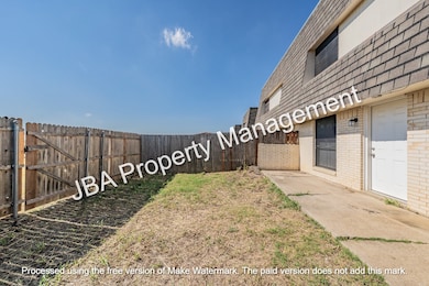 View of fenced backyard