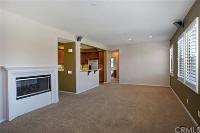 Plantation shutters line the living and dining are