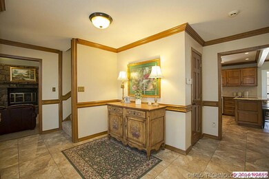 Inviting entry has large scale tile. Opens to grea