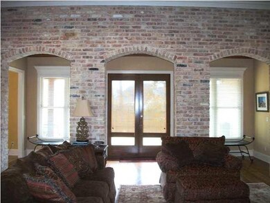 Huge Family Room with Brick Archways