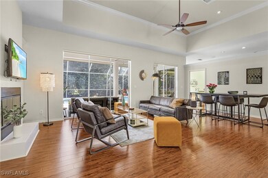 Living room featuring ornamental molding, a ceilin