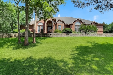 View of front of house with brick siding