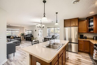 Open-concept main floor with new LVP flooring.