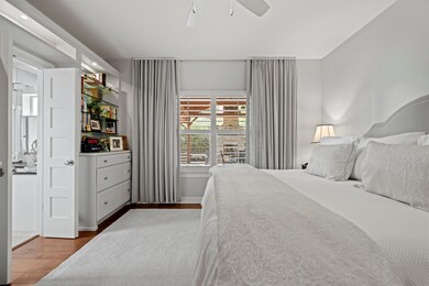 Bedroom featuring wood finished floors and a ceil