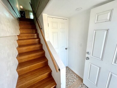 Ground Level Foyer with Door to Laundry Room