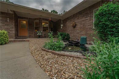 Enjoy the front of your home overlooking this Koi Pond