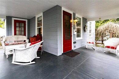 Sweet front porch for sipping coffee in the mornin