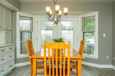 CASUAL  Kitchen Dining Area2 room for larger table & chairs
