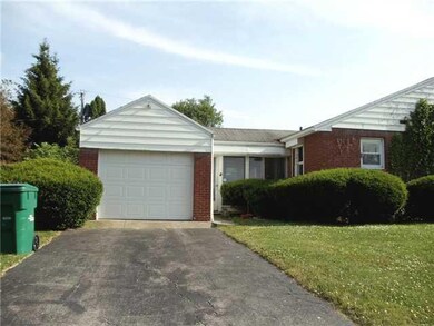 Exterior Front. One-car garage with garage door op
