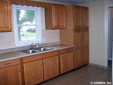 Kitchen. Oak Cabinets, Formica counter & Stainless