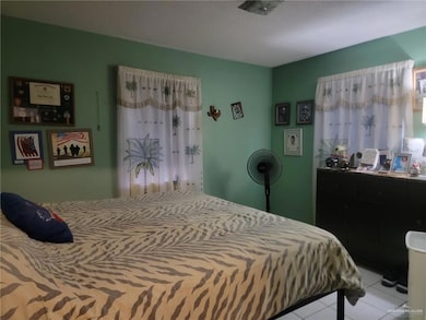 View of tiled bedroom