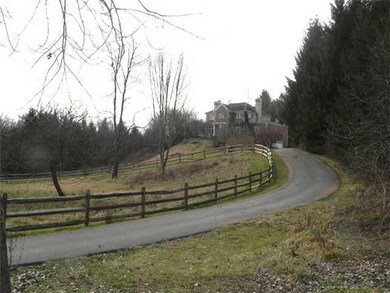 Exterior Front One third of a mile newly paved dri