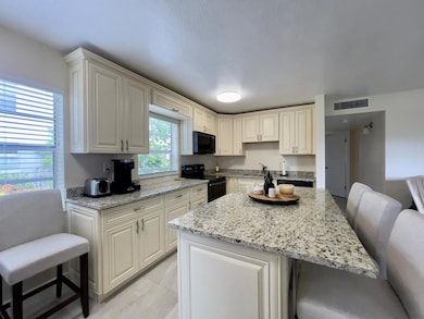 117 Flanders C, Delray Beach, FL 33484 - photo 2