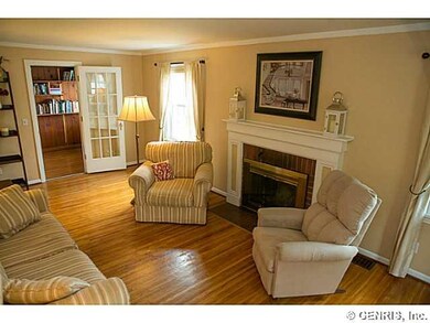 Living Room well appointed room with wood burning 
