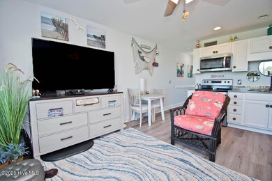 Large screen tv with storage dresser