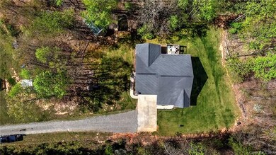 Wooded Lot with side entrance offers the up most in privacy