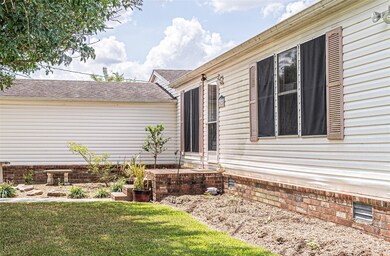 Well maintained lawn and landscaping