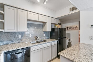 Kitchen with a pantry tucked back across from the
