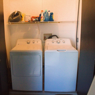 Washer & Dryer Located on Front Porch
