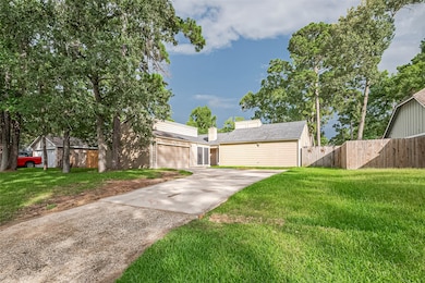 This photo shows a modern, single-story home with