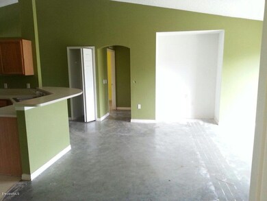 Greatroom to kitchen