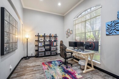 Just off the entry, a spacious office or flex spac