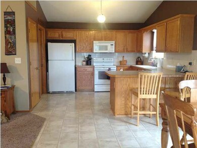 Spacious open kitchen dining room with eating bar