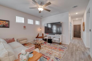Living room featuring light wood-type flooring an