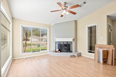 Living room charm redefined with a cozy fireplace