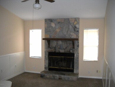 Family room with wood burning fireplace