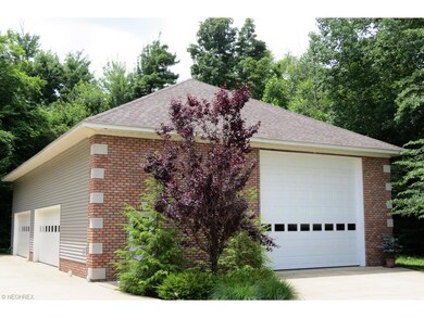 60x40 detached garage features two 14ft doors, two