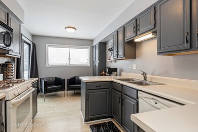 Charming kitchen area provides a space for coffee/