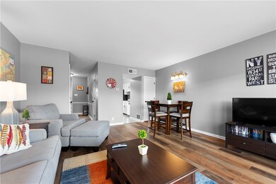 living/dining room with brand new flooring