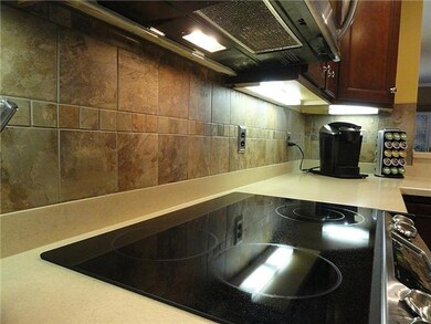 Custom tiled back splash and under counter lighting.