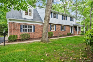 Long front porch perfect for lazy summer days out of the sun.