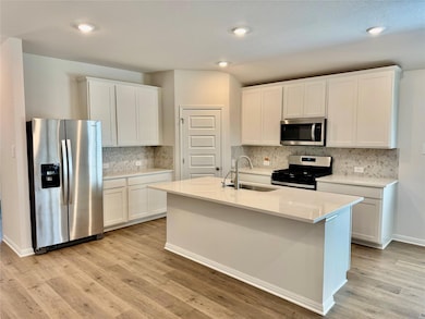 200 Coopers Hawk Crest, Cedar Creek, TX 78612 - photo 2