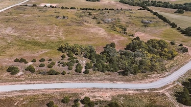 Aerial view of property's location featuring rural landscape